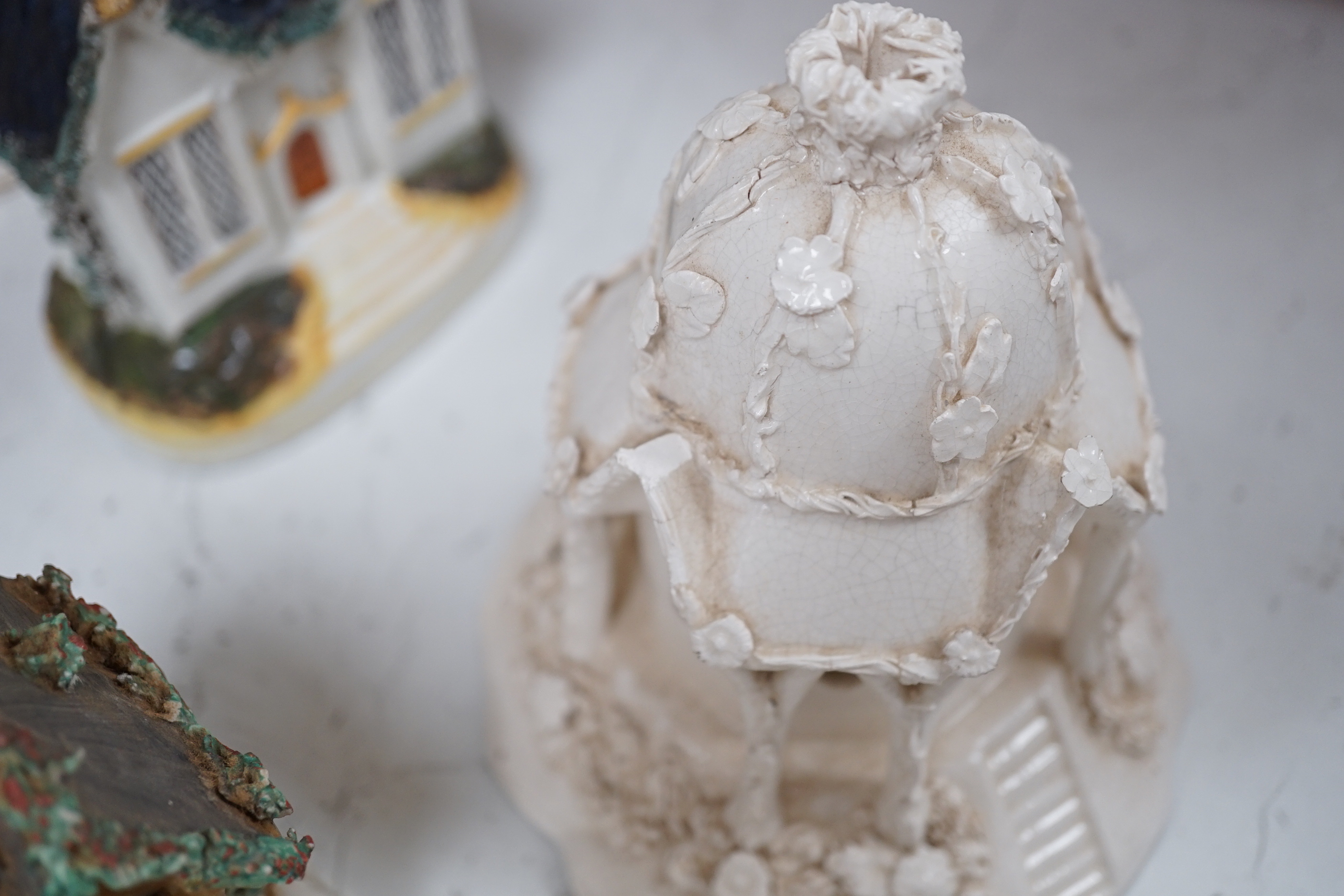 Thirteen Staffordshire 'cottage’ pastille burners or models